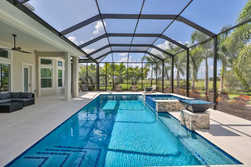 Raised spa with glass tile — Del Coronado custom pool project by Wahoo Pools in Tampa Bay, FL