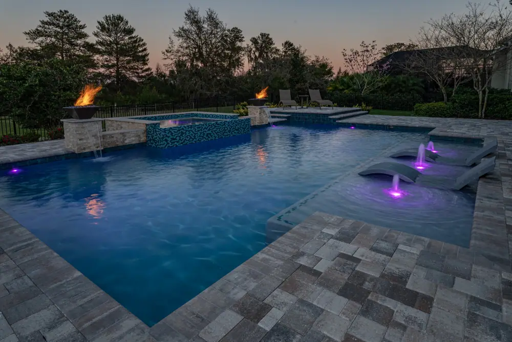 Resort-style deck — Hawk Oasis custom pool project by Wahoo Pools in Tampa Bay, FL