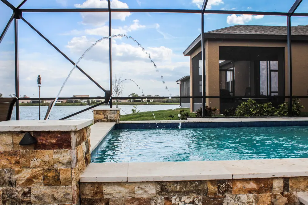 Cobalt glass tile spa — Lakeside Serenity custom pool project by Wahoo Pools in Tampa Bay lakefront