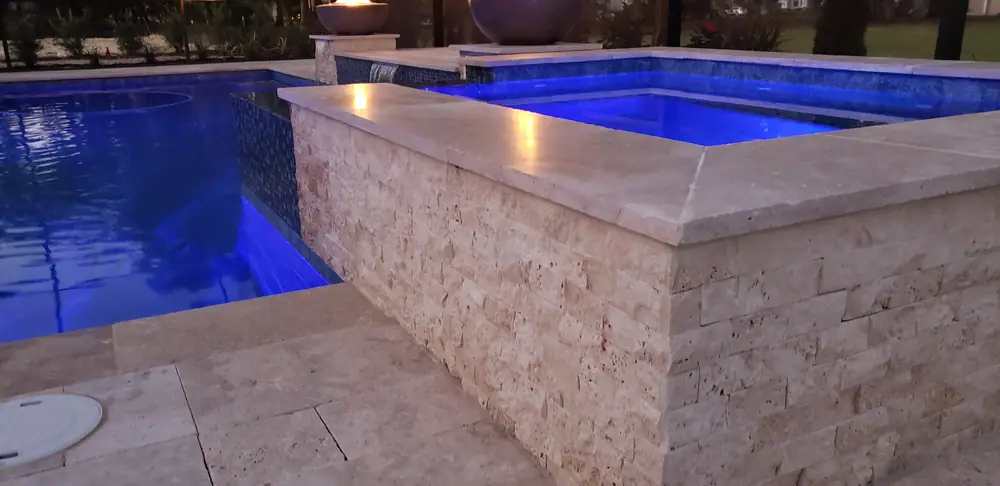 Pool deck at dusk — Lithia Forest custom pool project by Wahoo Pools in Lithia, FL