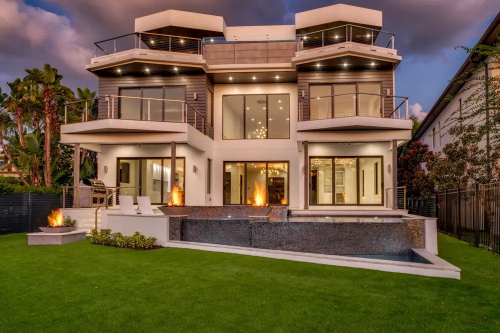 Contemporary pool at golden hour — Modern Sunset custom pool project by Wahoo Pools in Tampa, FL