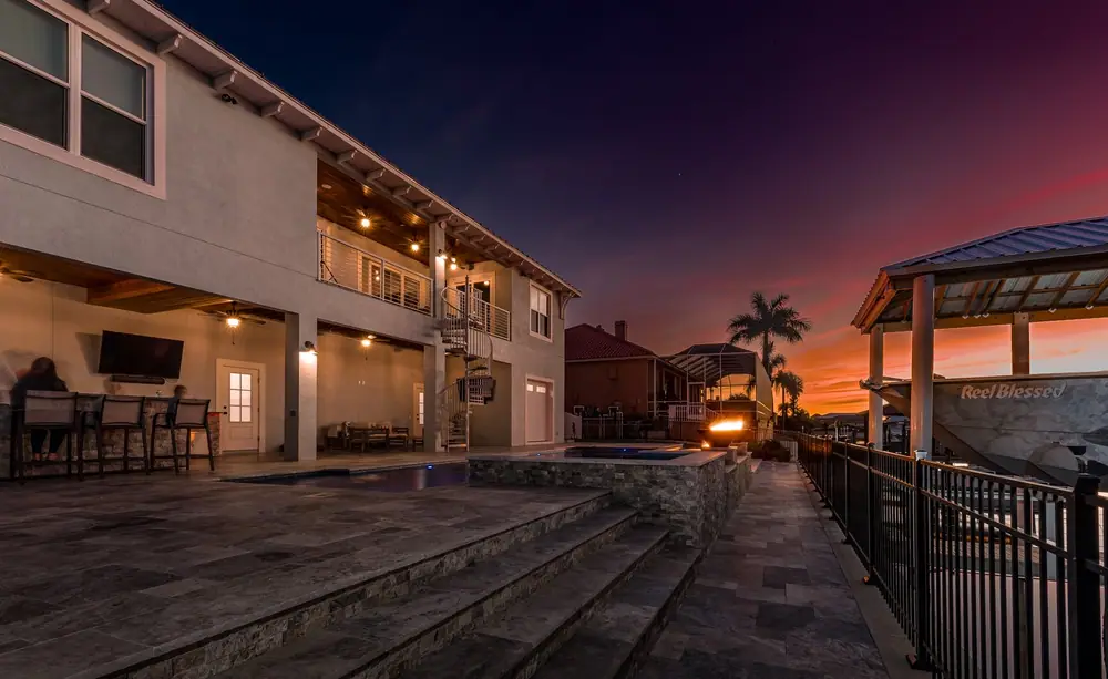 Boat dock view — Reel Blessed Waterfront custom pool project by Wahoo Pools in Apollo Beach, FL