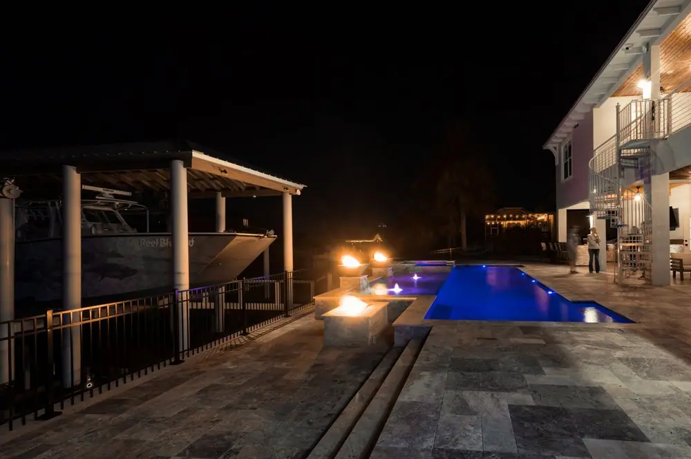 Canal-front deck — Reel Blessed Waterfront custom pool project by Wahoo Pools in Apollo Beach, FL