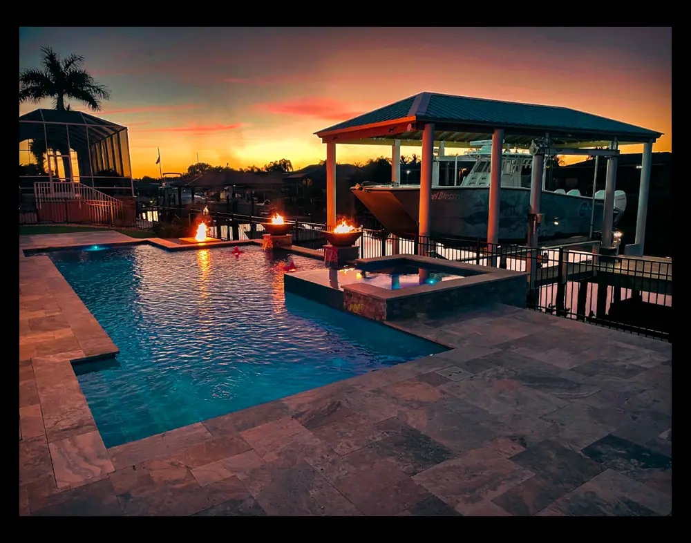 Canal-front pool overview — Reel Blessed Waterfront custom pool project by Wahoo Pools in Apollo Beach, FL