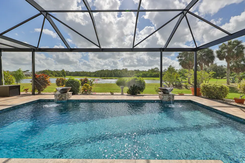 Evening lighting — Signature 1101 custom pool project by Wahoo Pools in Tampa Bay, FL