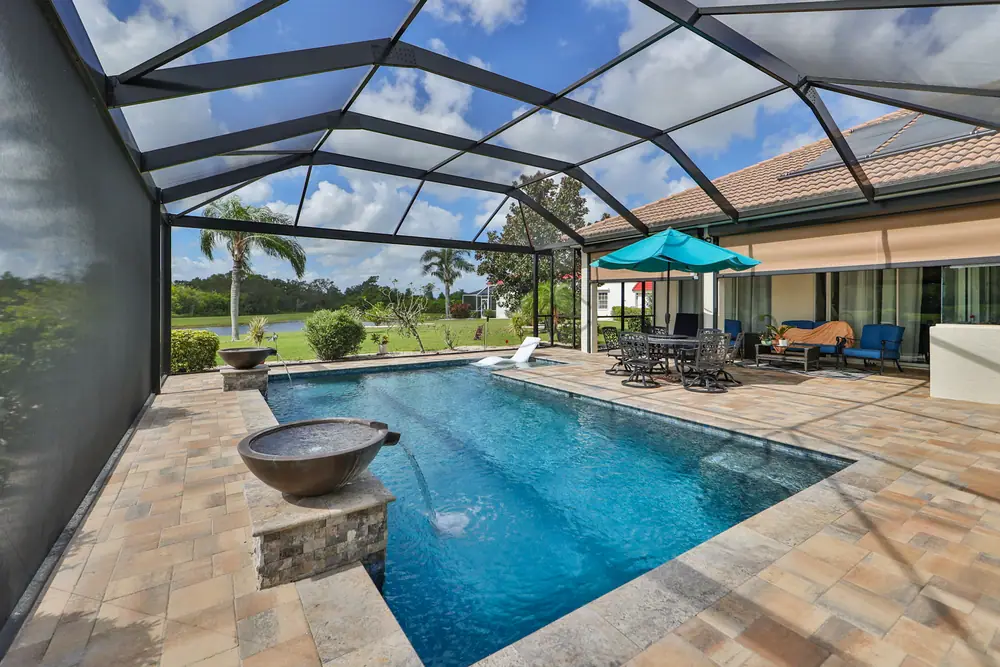 Infinity edge view — Signature 1101 custom pool project by Wahoo Pools in Tampa Bay, FL