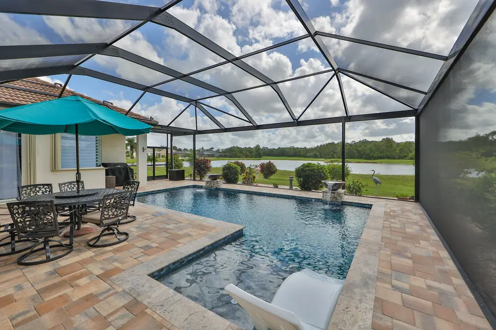 Infinity-edge pool overview — Signature 1101 custom pool project by Wahoo Pools in Tampa Bay, FL