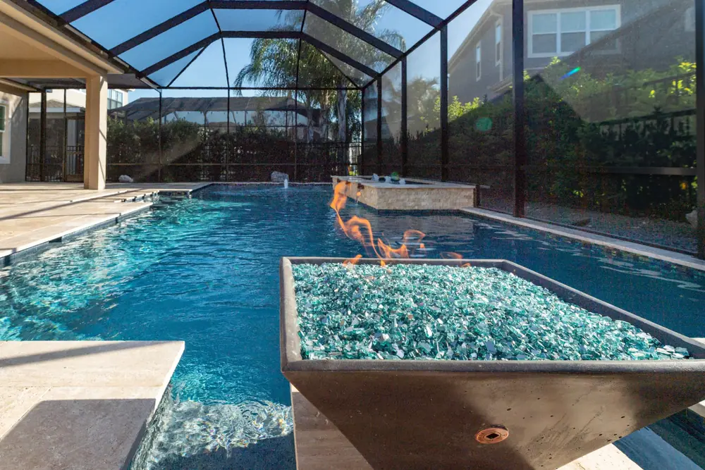 Freeform pool by day — Tequila Sunrise custom pool project by Wahoo Pools in Tampa Bay, FL