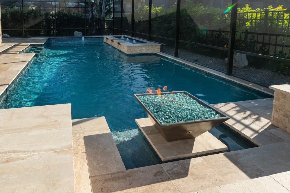 Daytime pool overview — Tequila Sunrise custom pool project by Wahoo Pools in Tampa Bay, FL