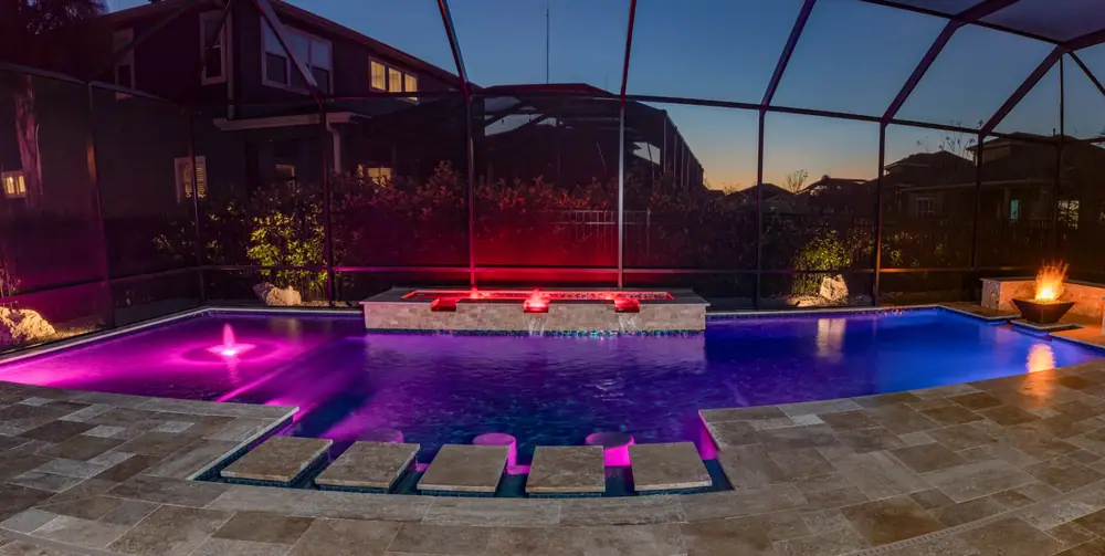 Night pool view — Tequila Sunrise custom pool project by Wahoo Pools in Tampa Bay, FL