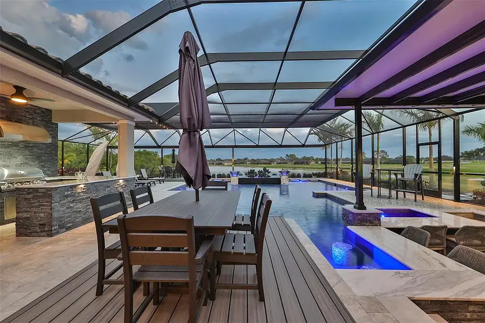 Pool with resort-style landscaping — Timeless Project custom pool project by Wahoo Pools in Tampa, FL