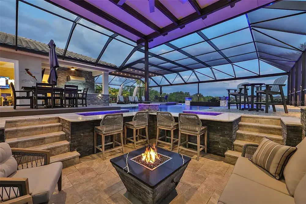 Poolside lounge area — Timeless Project custom pool project by Wahoo Pools in Tampa, FL
