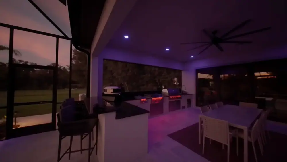 Twilight Lanai Estate — covered lanai dining area with LED accent lighting — Wahoo Pools project in Tampa, FL