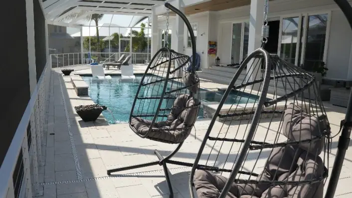 Glass tile close-up — Vera Canal Retreat custom pool project by Wahoo Pools in Apollo Beach, FL