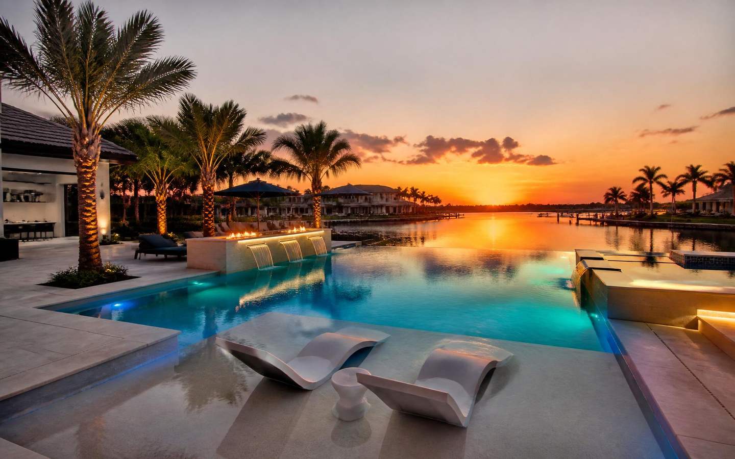 Luxury custom pool at sunset by Wahoo Pools in Tampa